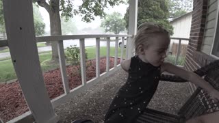 4 Year Old Plays Enjoys Rain Storm