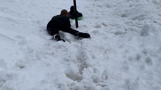 Guy Intercepts Sledding Kiddo from Pole