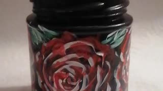Handpainted glass jar with roses