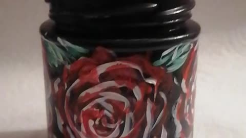 Handpainted glass jar with roses