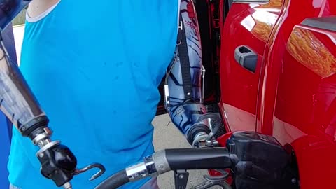 Amputee Operates Gas Pump With Ease