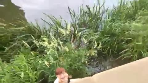 Ginger kid stuck on rope swing