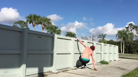 Skateboard red hat fence jump fail