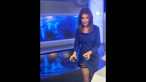 Charming TV presenter showed where the microphone is attached