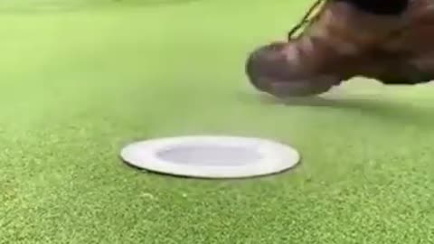 How a golf ball hole is made