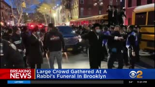 Large crowds gather in NYC for rabbi's funeral