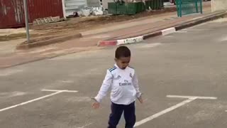 Kid pulls off soccer trick shot, celebrates like Ronaldo