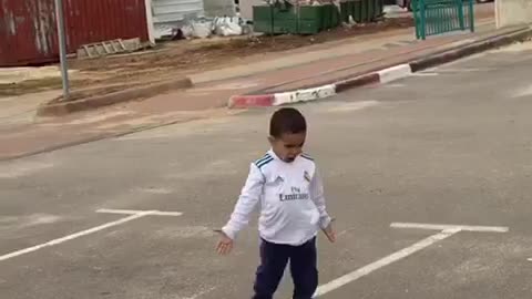 Kid pulls off soccer trick shot, celebrates like Ronaldo
