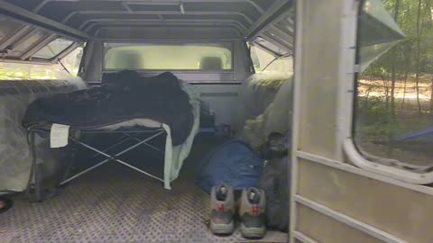 Truck camping with an extra large comfortable cot.