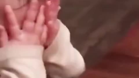 Funny baby eating reaction