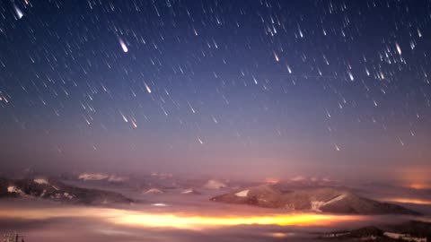 Impressive meteor shower seen from a mountain