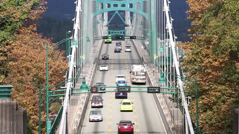 Cars Pass Throw Hanged bridge Of Old Town