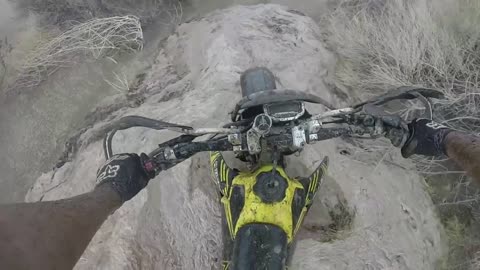 Brave Biker Rides His Dirt Bike Through A Flash Flood