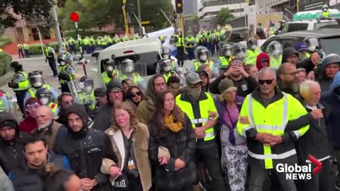 New Zealand police confront anti-COVID-19 mandate protesters outside parliament