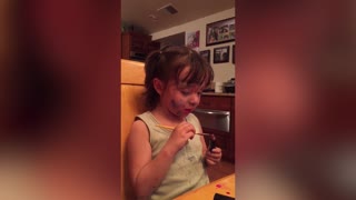 Girl Uses Paintbrush To Apply Lipstick