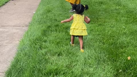 Funny indian baby playing peekaboo with bunny