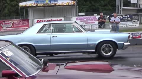 1965 GTO goin rounds and pullin wheelies