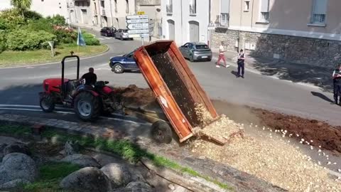 French Farmers Protest Ban On Irrigation By Dumping Manure