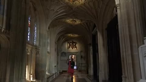 The Queen’s Piper plays a lament from the North Quire Aisle,