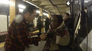 Luodong Briefly Massages Elderly Black Woman In Subway Station