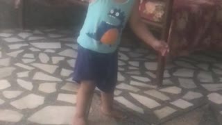 Cute Little baby is playing Cricket in his own style