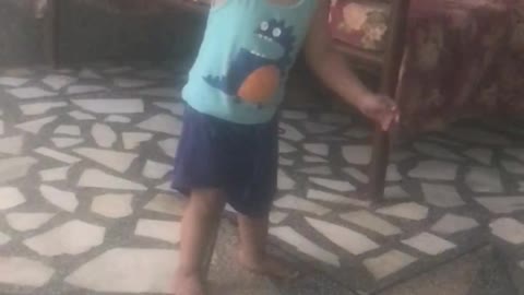 Cute Little baby is playing Cricket in his own style