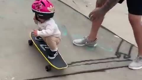 Baby balancing skateboard like pro