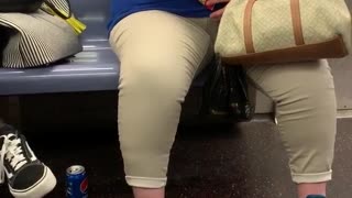Woman dozes off and falls asleep while eating cheez its on subway
