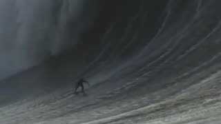 Astonishing footage of surfer Mason Hyce Barnes riding an enormous wave off