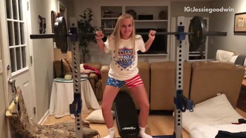 Girl us flag shorts weights fall off pole