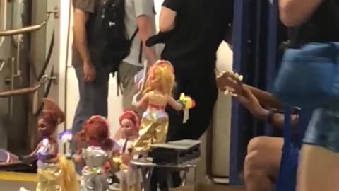 Dancing dolls music played in subway station