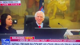 judge in Trump's case smiles for his closeup