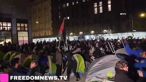 Students clashing with police at the New York University occupied zone.