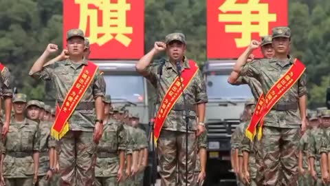 Following the Chinese tankmen, servicemen of the Tibetan Military District of the Western Zone