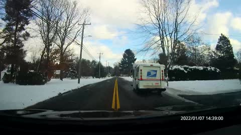 Guy clears snow by throwing into road and a mail truck snow violation