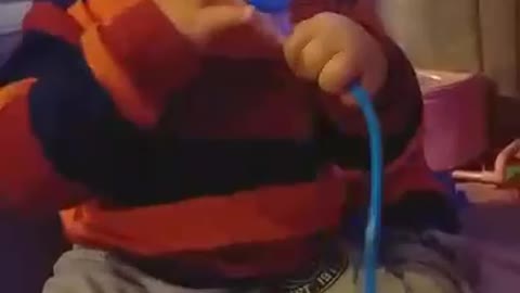 a small child plays a doctor