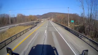 Semi Driver Has Close Call with Deer Crossing Highway