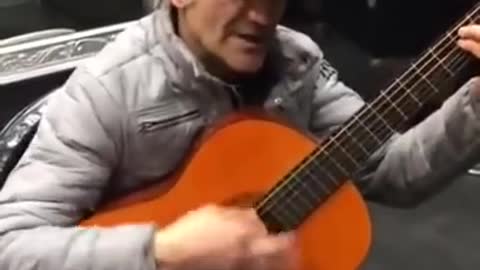 Old man plays the mashup of themes from "The Good The Bad and the Ugly" and A "Few Dollars More"