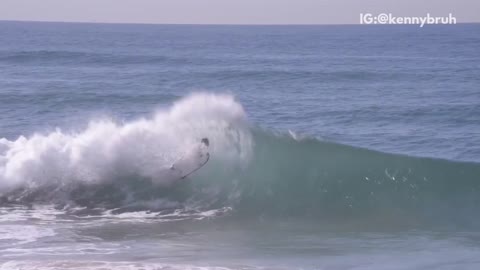 Guy surfboard gets knocked out into air by huge wave