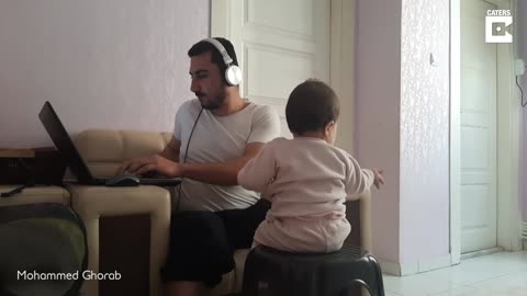 Baby Distracts Dad From working from house