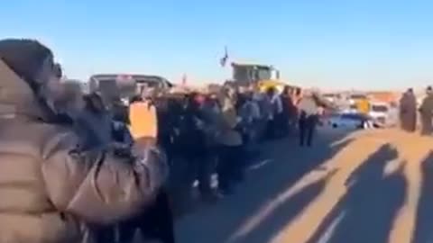 Milk River, Canada: Protesters link arms as police deployed (Feb. 11, 2022)