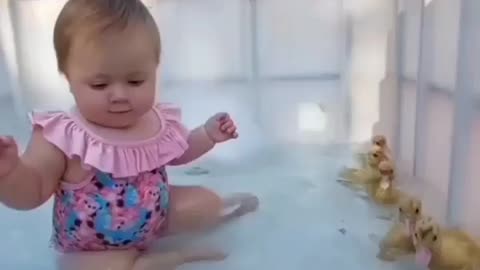 Baby water playing