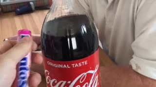 Trick when opening a vial Coca Cola