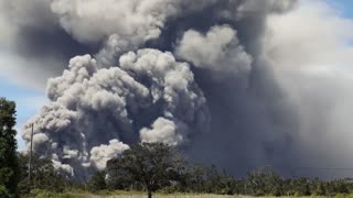 Huge ash plume from the rockfalls at Halemaumau Crater, Kilauea Volocano