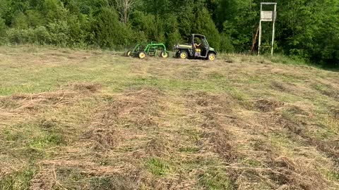 Raking hay with the John Deere Gator 835!