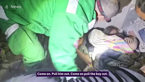 Moment Palestinians rescue children from rubble in Gaza