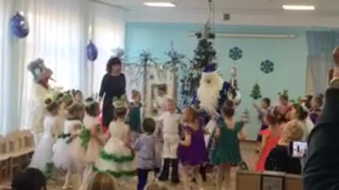Far away in Russia Santa Claus came to children for the new year in kindergarten