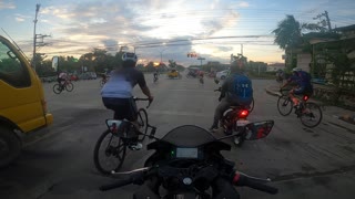Large Group of Cyclists Ignore Red Light
