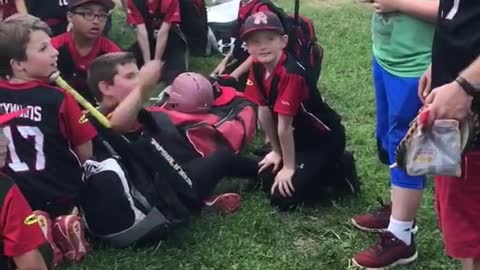 Army sister surprises little brother at ballgame