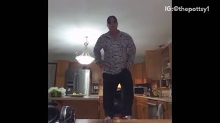 Man in grey white shirt falls off chair